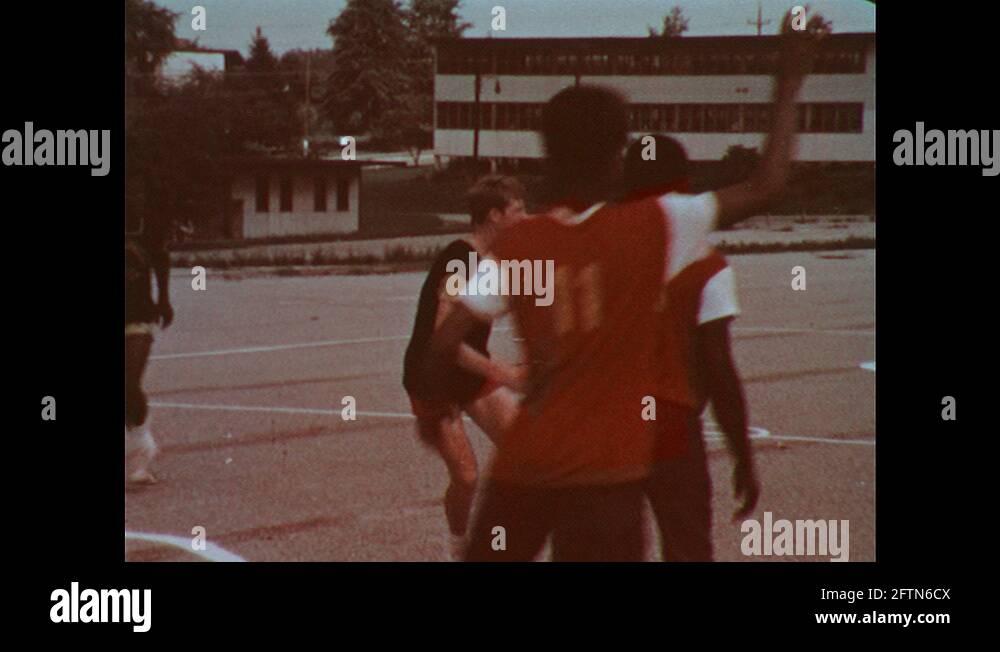 1970s Boys playing basketball / Coach yelling at boys Stock Video Footage Alamy