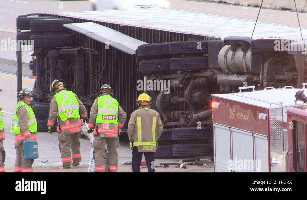 Tractor trailer truck accident with police and firefighters at accident ...