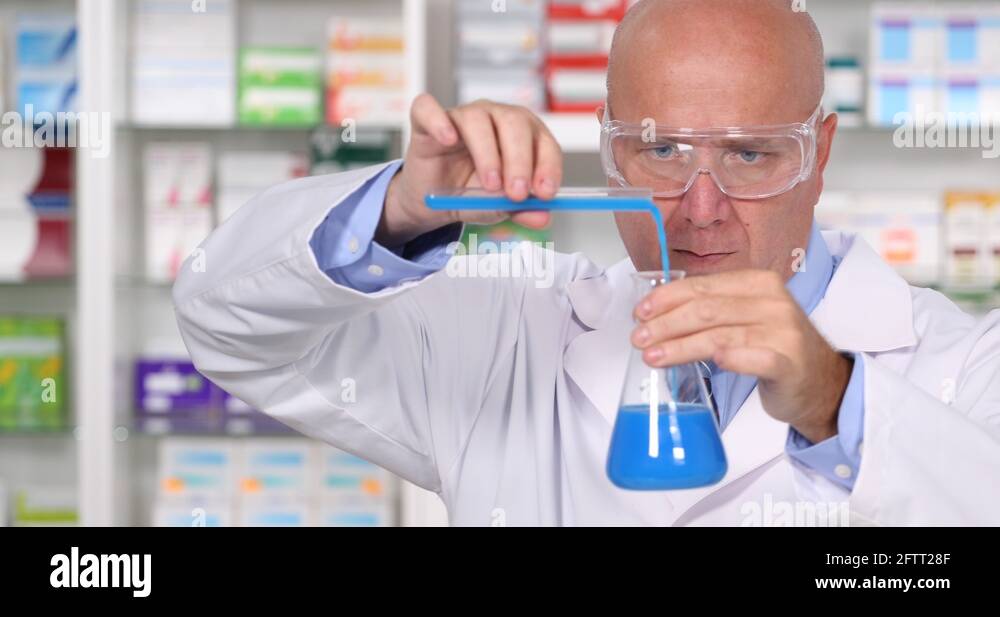 Pharmaceutical Laboratory Chemist Man Preparing One Medication Liquid