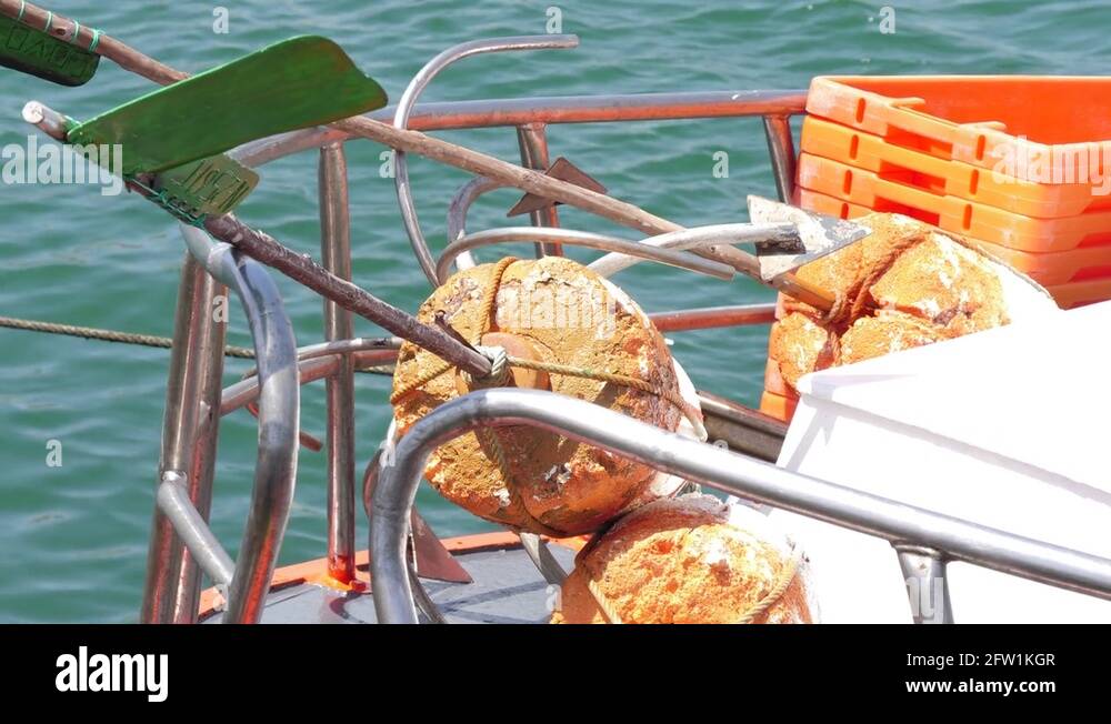 Fishing nets buoy marker flags used on a small fishing vessel slow