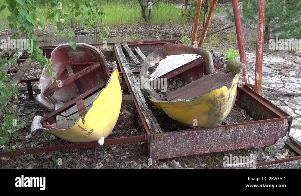 Broken boat ride in the Pripyat amusement park Stock Video Footage - Alamy