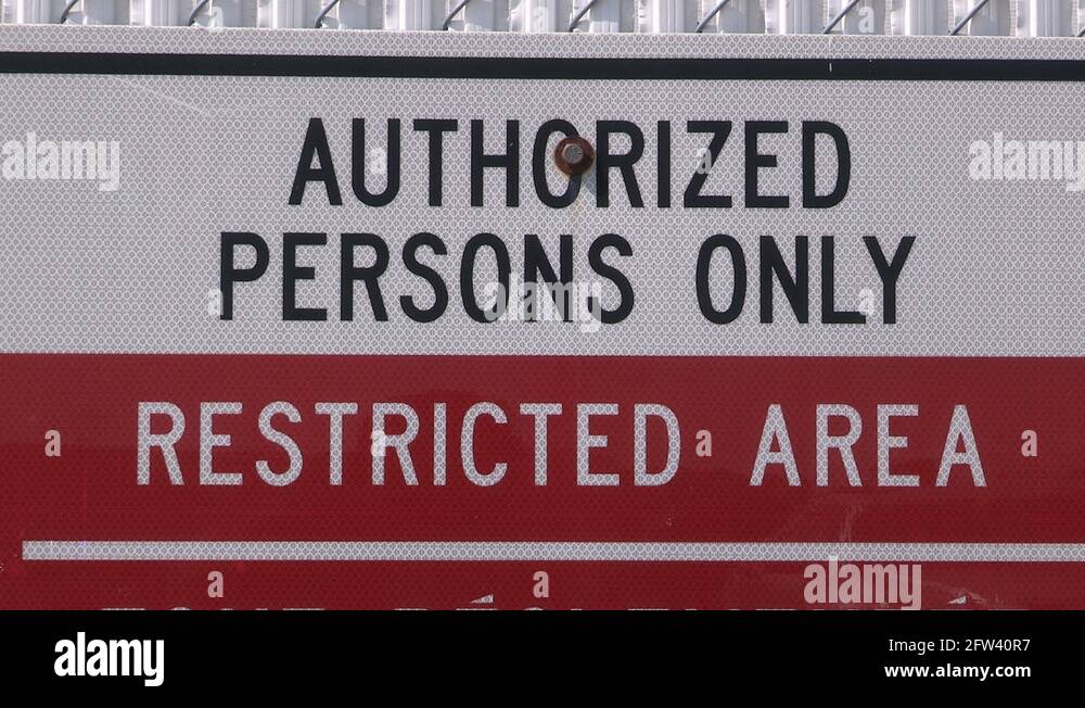 Airport security restricted area warning sign Stock Video Footage Alamy