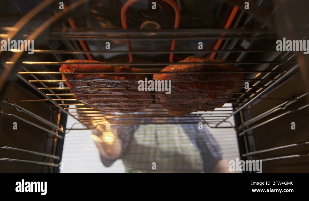 Cooking grilled steak ribeye in the oven with broiler. Grill element