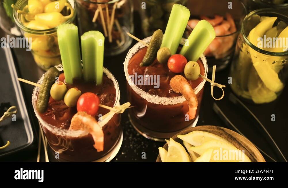 Bloody mary cocktail bar with variety of garnishes Stock Video Footage