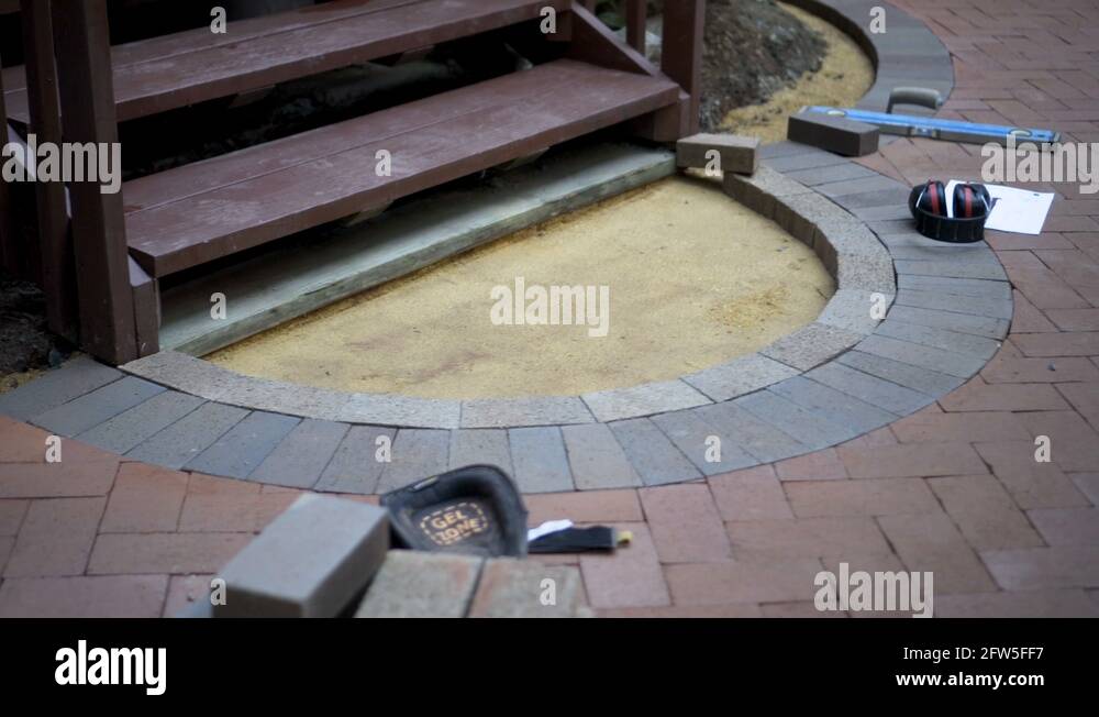 Laying patio pavers Stock Videos & Footage HD and 4K Video Clips Alamy