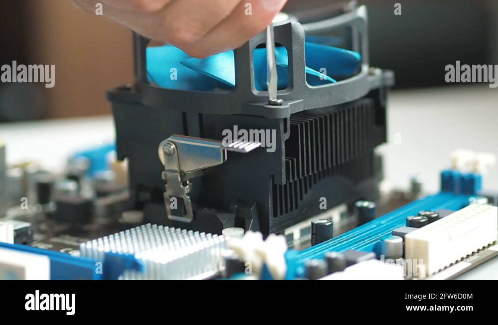 Removing And replacing Fan CPU on the motherboard. Installing and ...