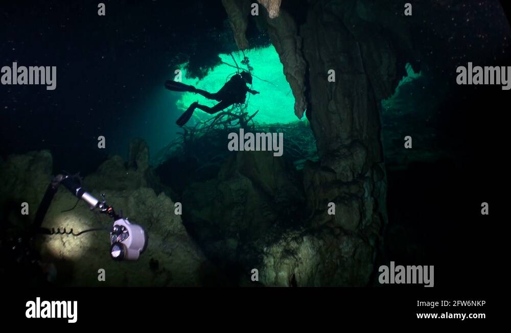 Scuba diving underwater in caves of Yucatán Mexico cenotes Stock Video