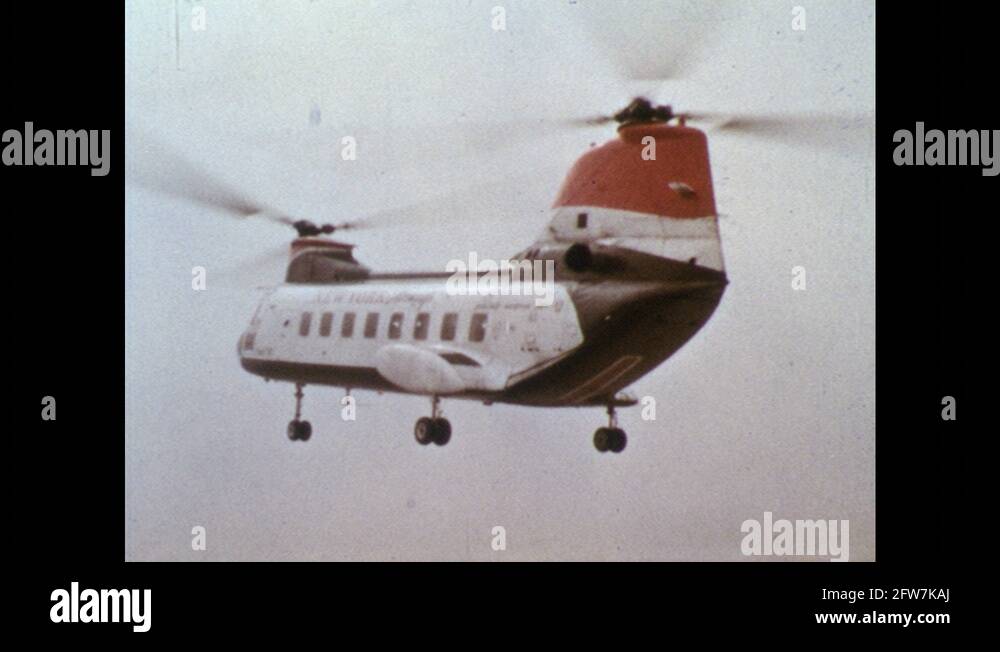 1960s Tandem rotor helicopter in preparing to land. Helicopter rotor