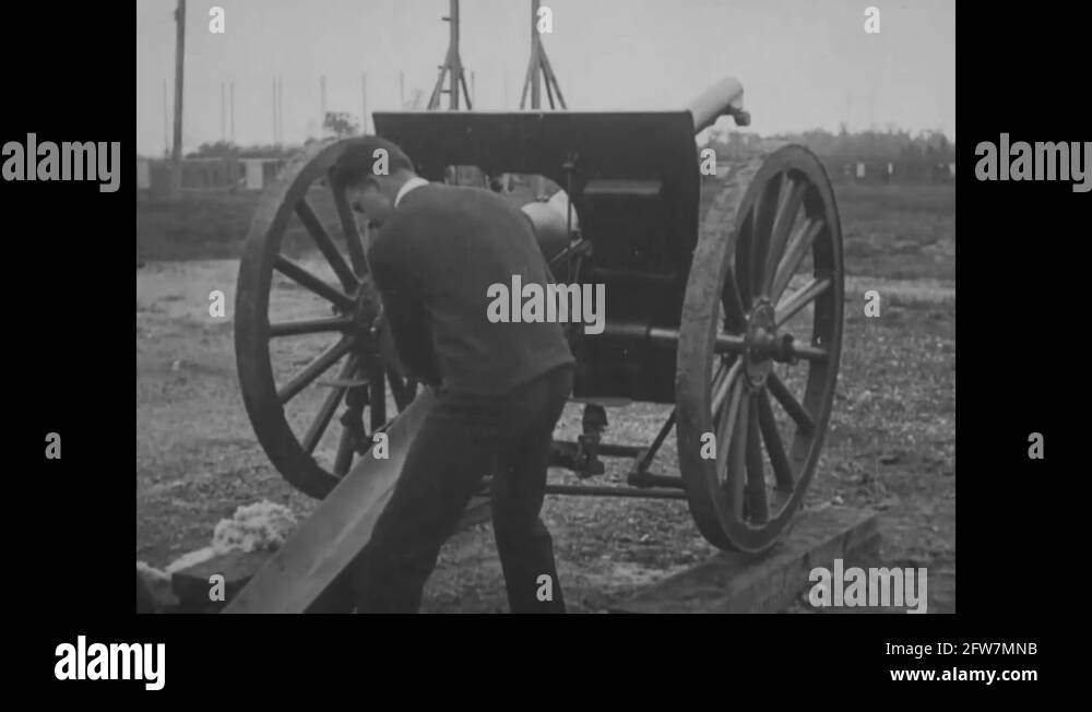 Soldiers load and fire 8 inch Howitzer continuously - 1920-1926 Stock ...