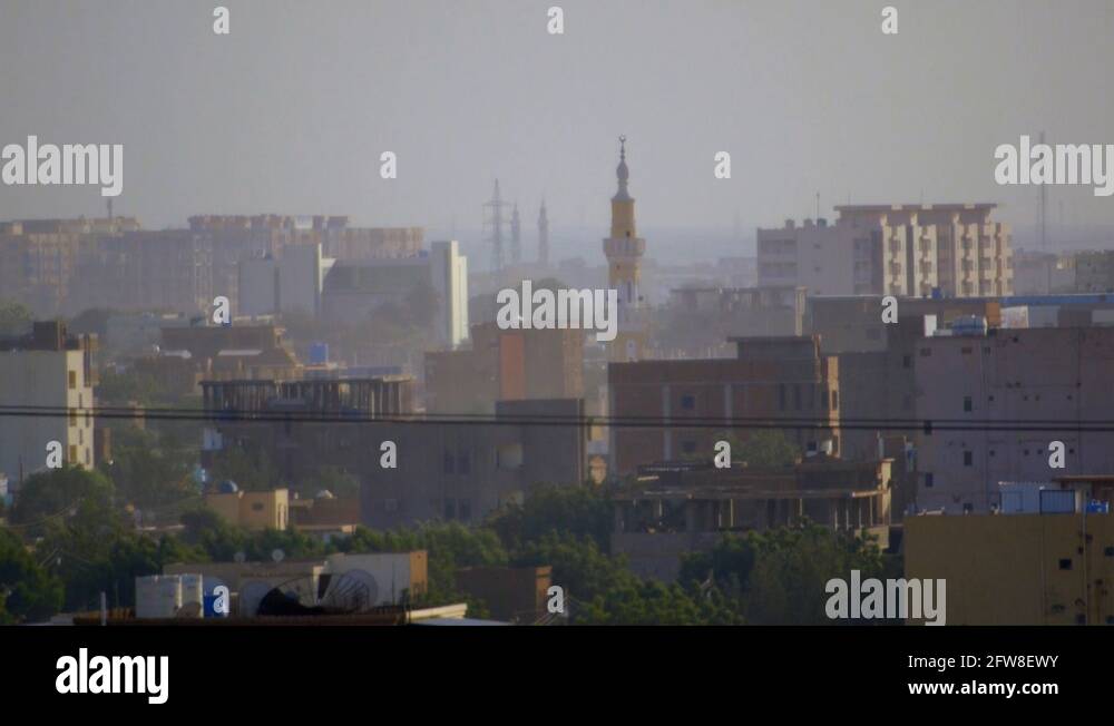 Zoomedin view of Khartoum, Sudan showing houses, trees, a mosque