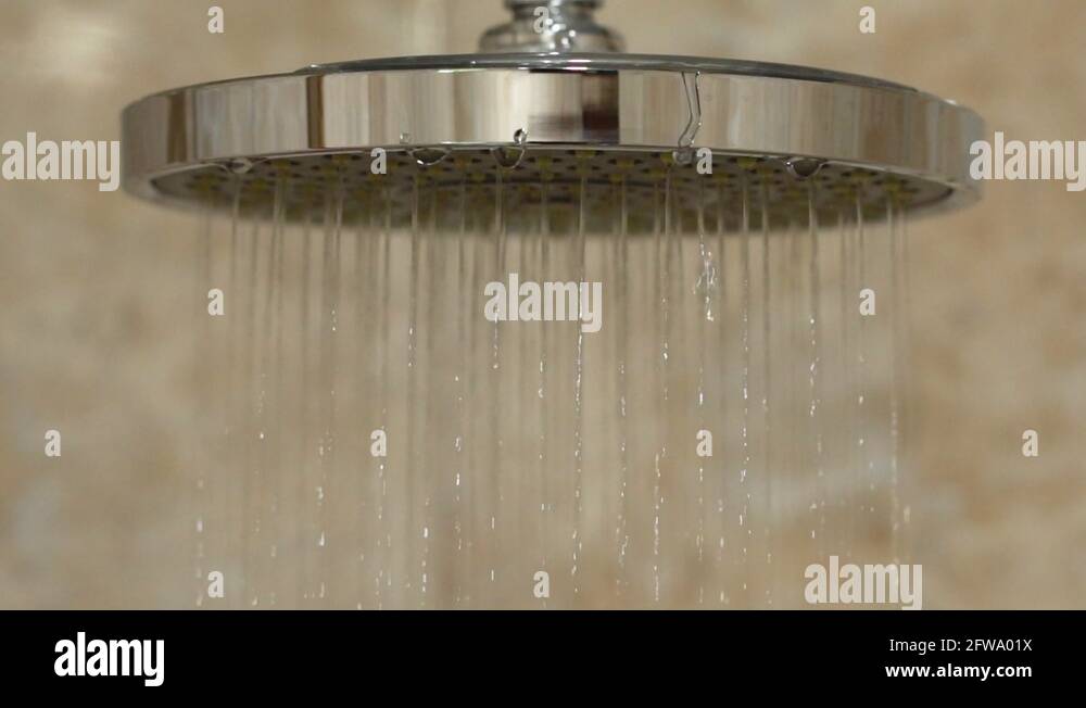 Shower in hotel bathroom. Dripping drops Stock Video Footage Alamy