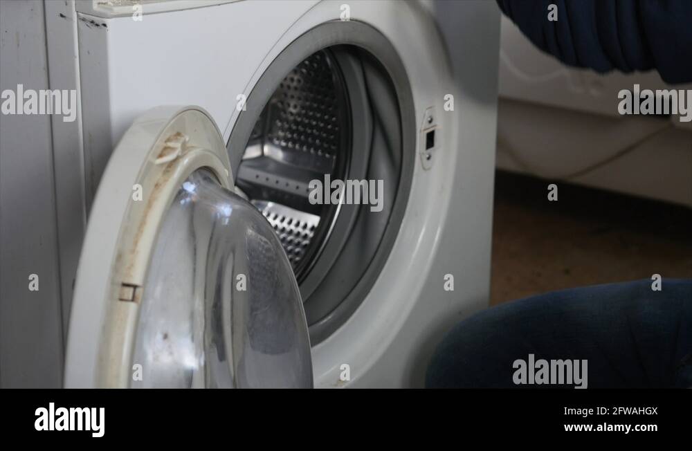 Fix washing machine Stock Videos & Footage HD and 4K Video Clips Alamy