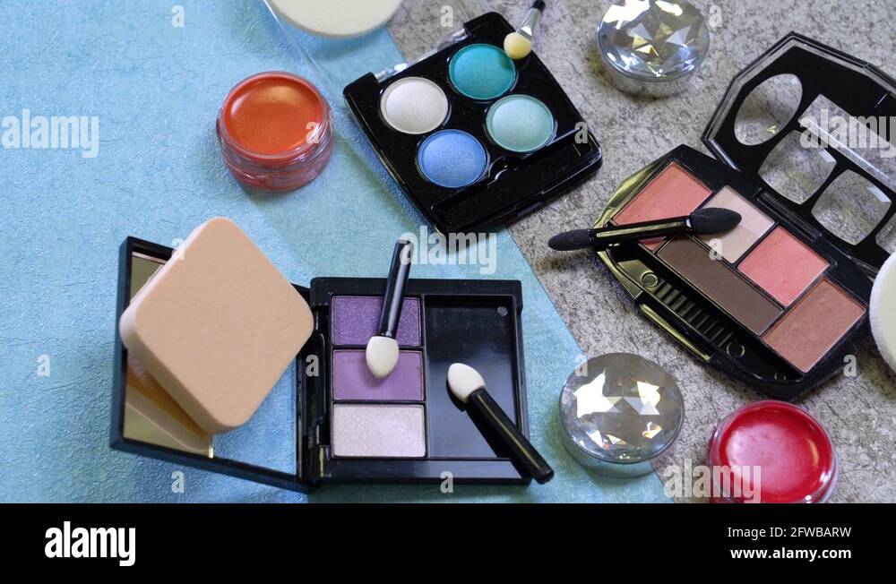 cosmetic tools and applicators scattered and open Stock Video Footage