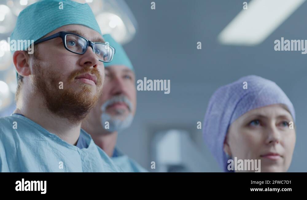 Diverse Team Of Professional Surgeon Assistants And Nurses Standing Proudly Stock Video Footage 