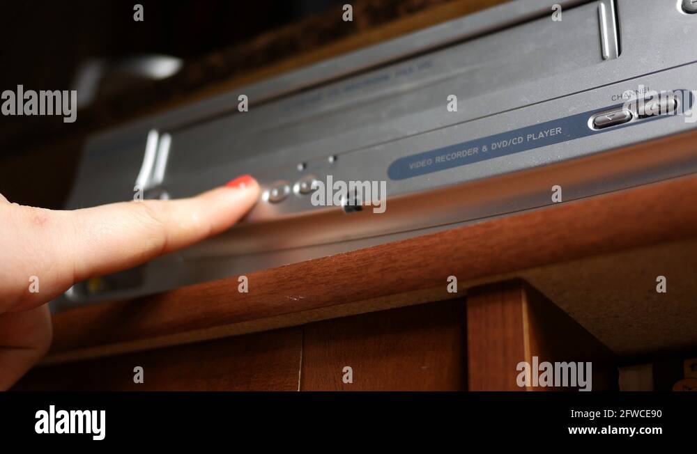 Removing a VHS Tape into VHS player Normal version Stock Video Footage Alamy