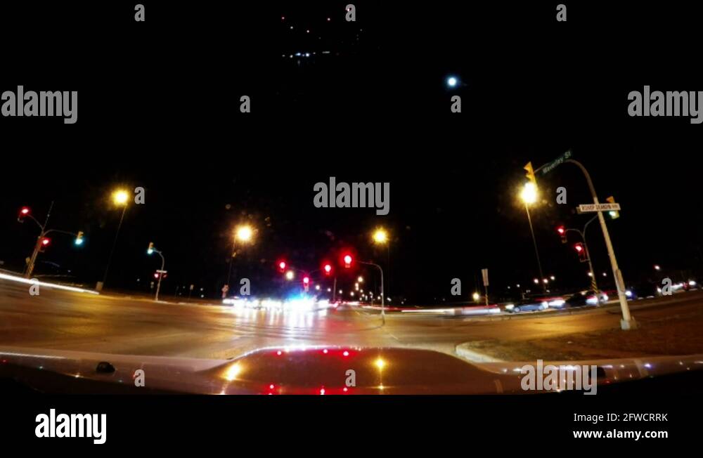 Driving at night with street lights, in Winnipeg Manitoba Canada on