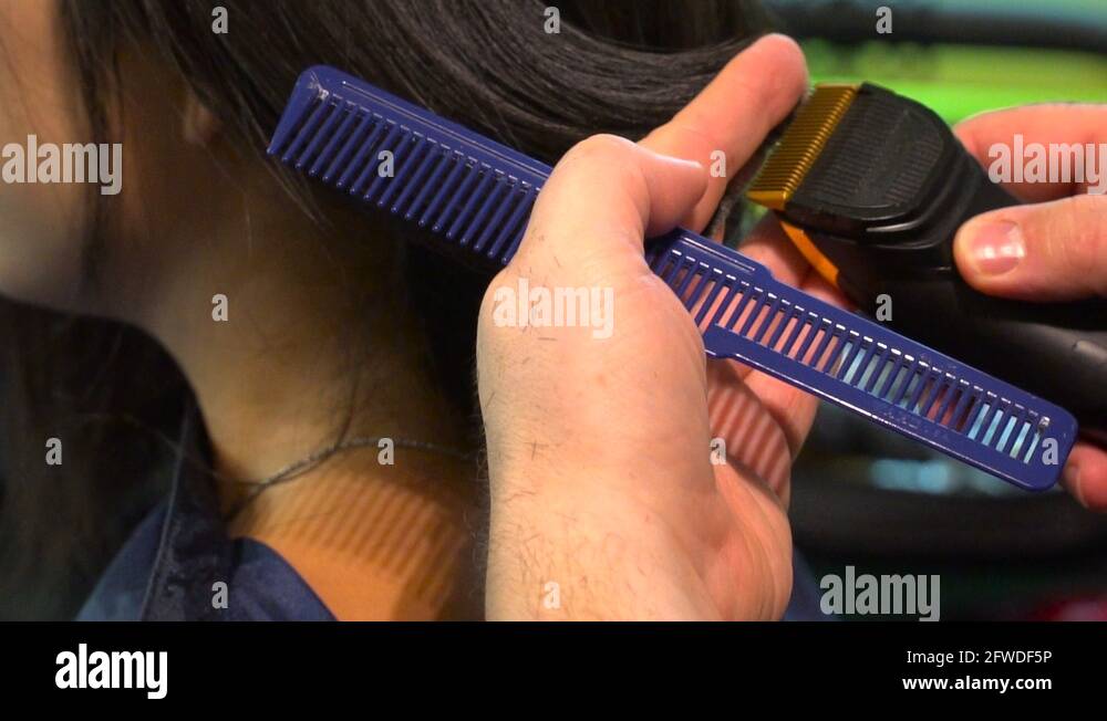Woman holding hair clippers Stock Videos & Footage HD and 4K Video