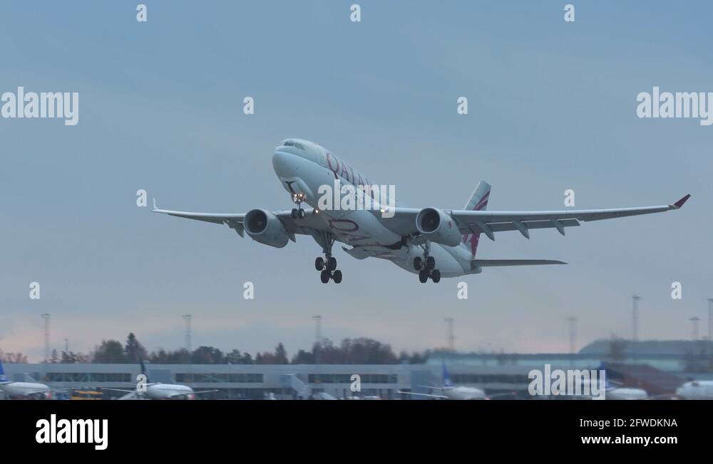 huge airplane takeoff steep climb gear retraction flying overhead Stock