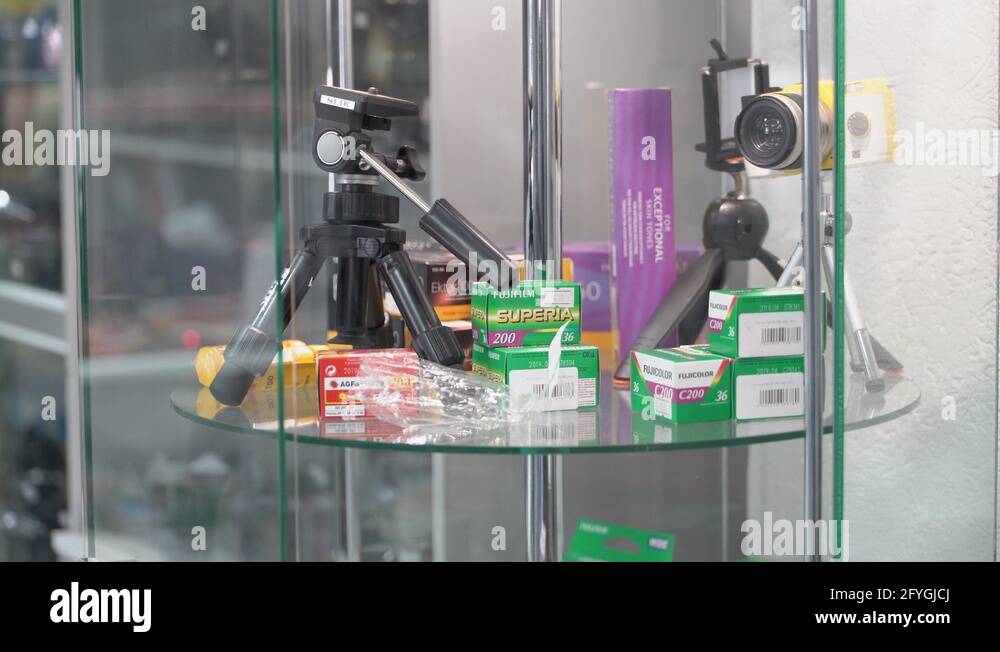 Interior of camera store New compact cameras and various negative films