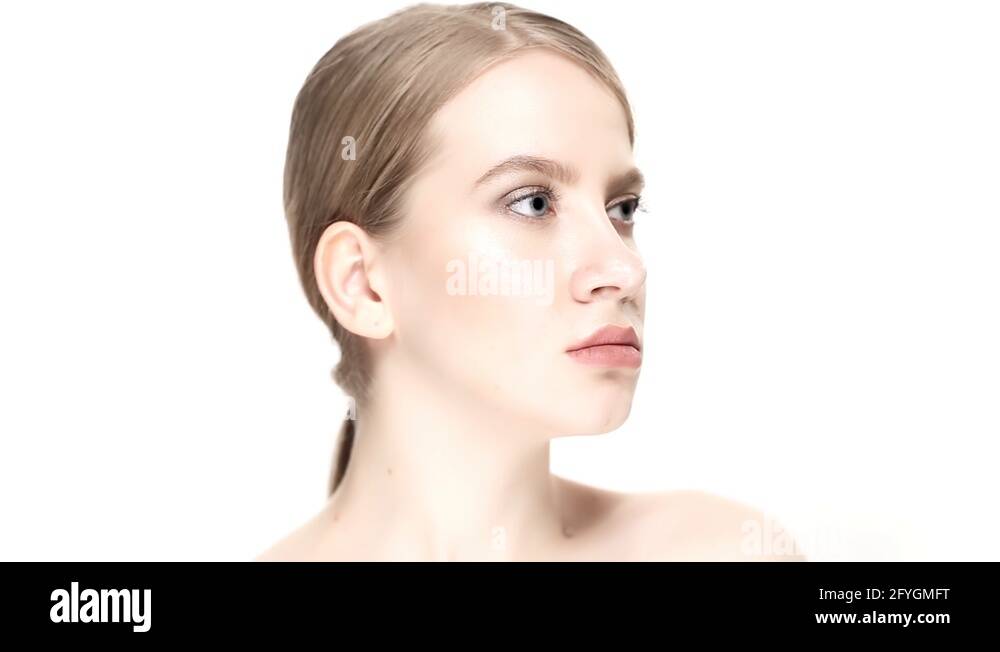 Professional a botox injection in cheekbones then the woman smiles