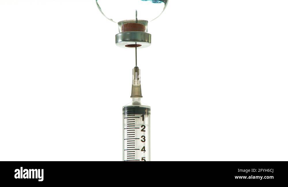 Syringe drawing up clear liquid Stock Video Footage Alamy