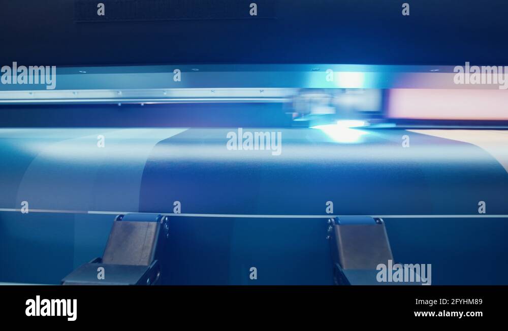 Large format printer printing on a roll of paper at high speed Stock