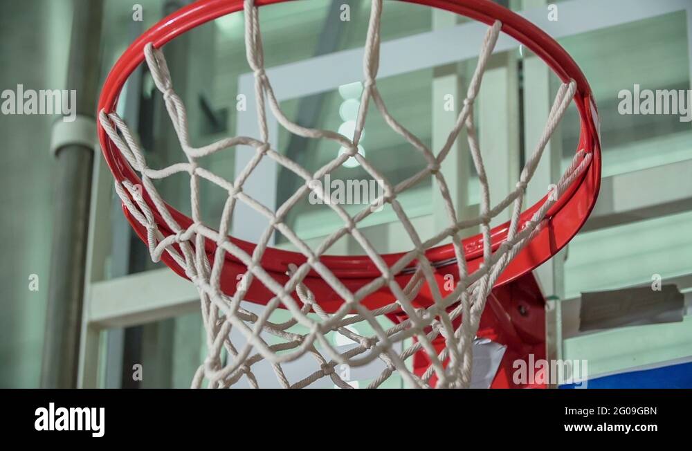 Basketball hits the rim but doesn't fall through the hoop Stock Video ...