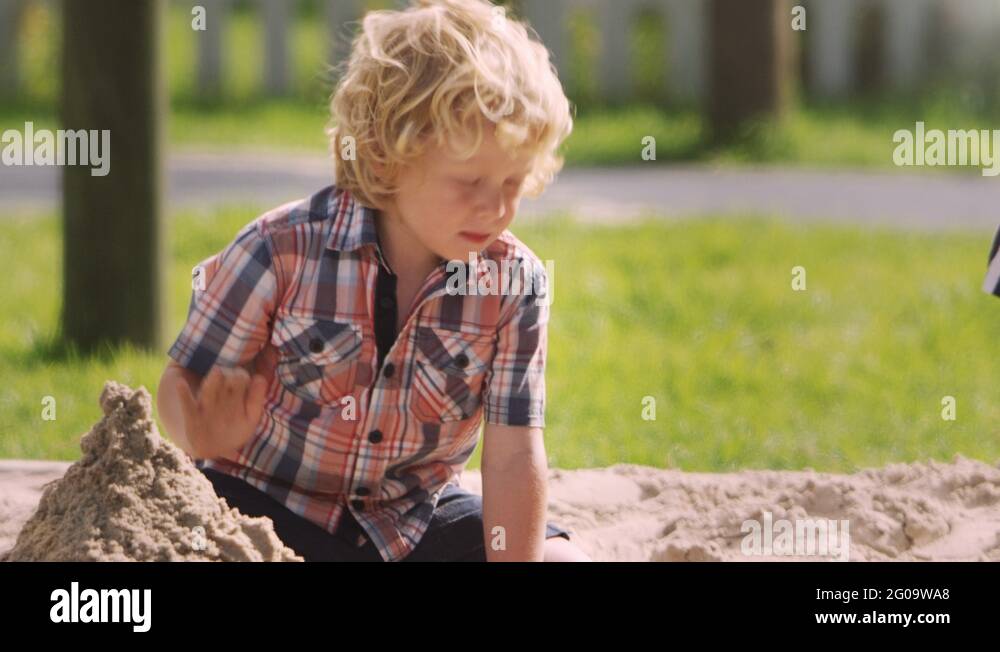 Children playing together in sand pit Stock Videos & Footage - HD and