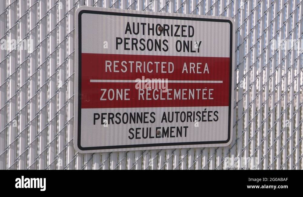 Airport security restricted area warning sign Stock Video Footage Alamy