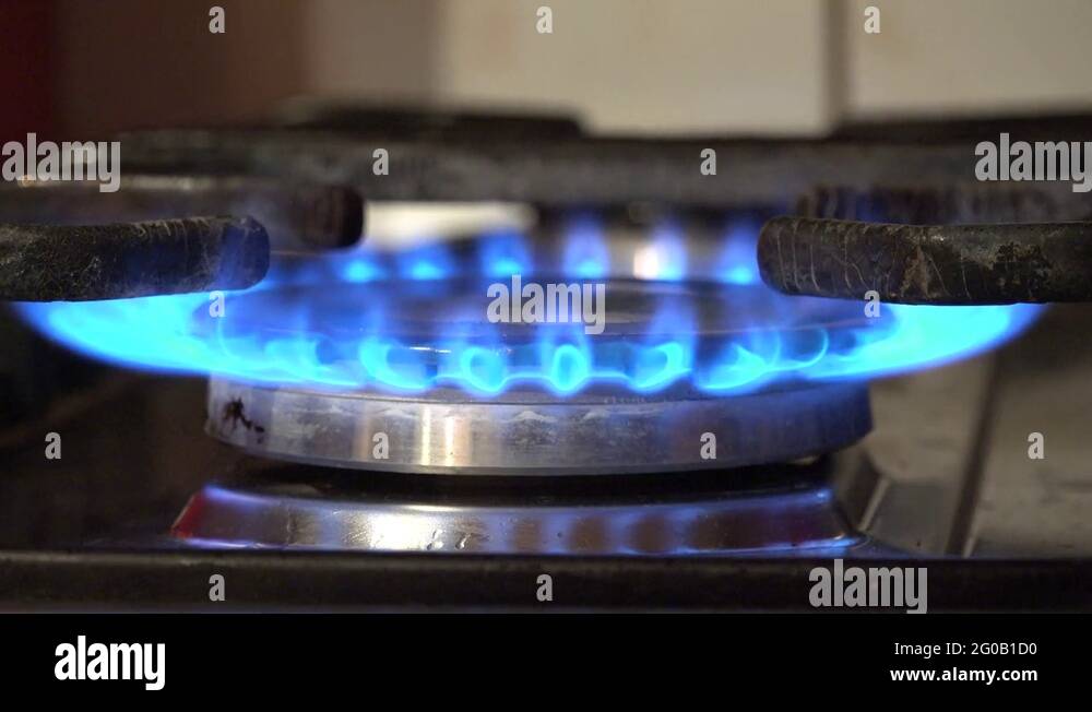 4K Gas burn blue flame at cooker machine dangerous fire power butane