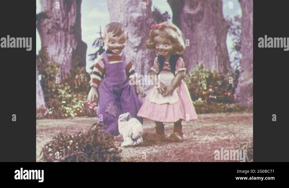 1950s: Stop-motion animation. Rabbit hops up to boy and girl. Rabbit ...