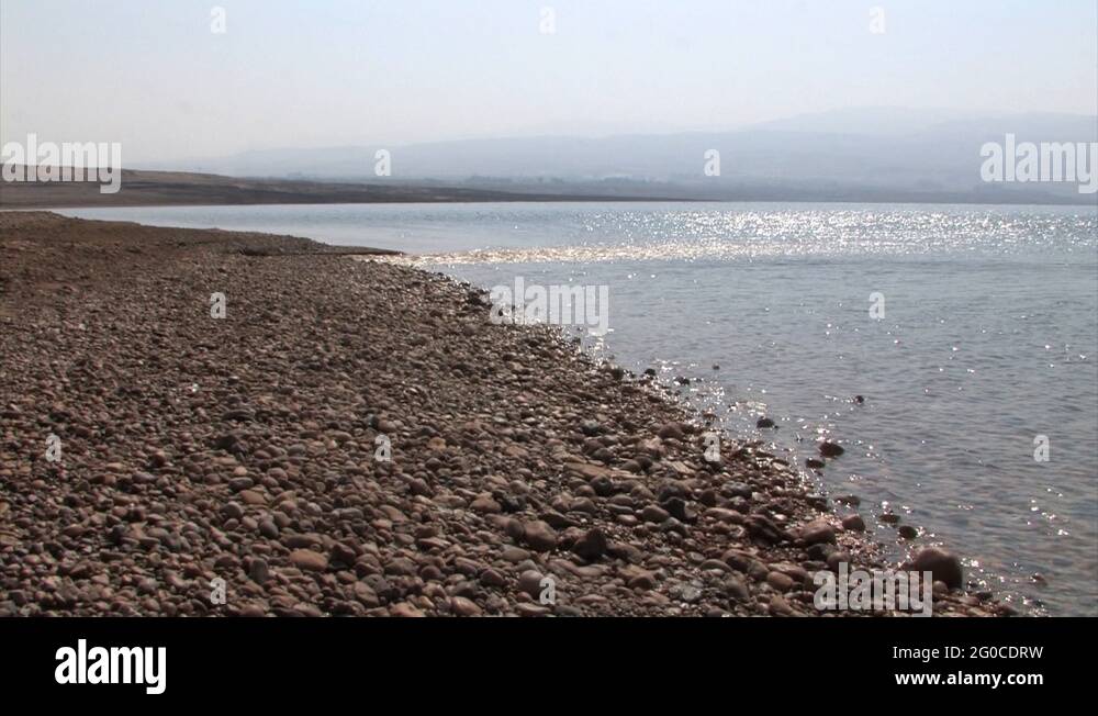 Jordan River flows into the Dead Sea Stock Video Footage Alamy