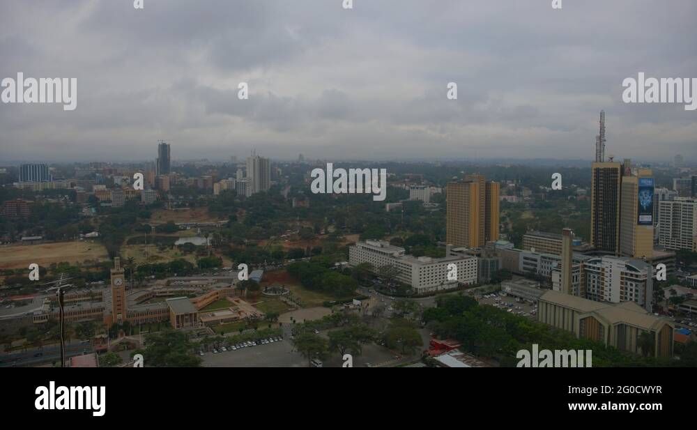 Parliament and clock tower in Nairobi skyline on a cloudy day from a