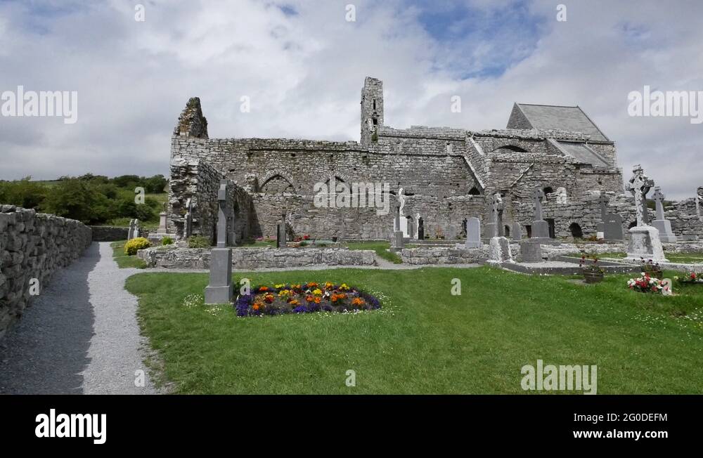 Ireland Corcomroe Abbey with flowers in cemetery Stock Video Footage ...