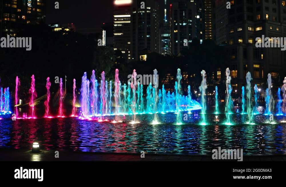 Colorful Night Time Fountain and Light Show at Suria KLCC Stock Video