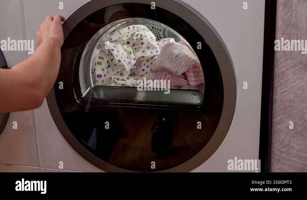Clothes dryer door Stock Videos & Footage HD and 4K Video Clips Alamy