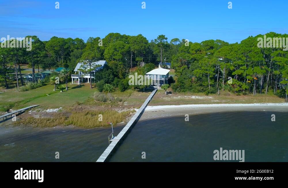 Drone shot waterfront homes in Carrabelle FL 4k 60p Stock Video Footage