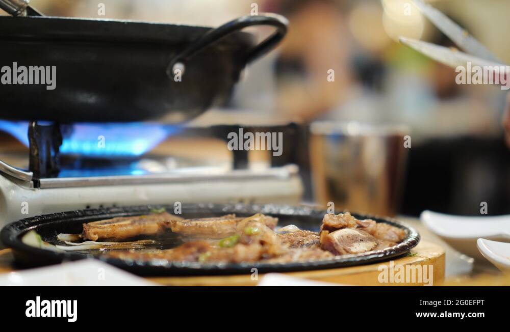 Cutlery in an authentic Korean restaurant tongs and scissors Stock