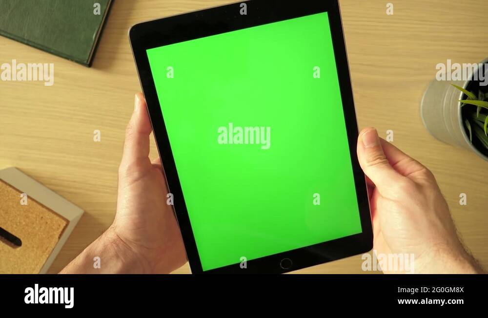 Holding a Green Screen Tablet and Making no Gestures Vertical Stock