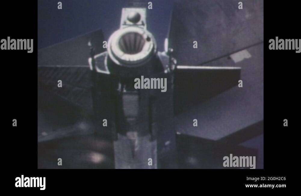 1960s: Rear engine of rocket plane. Rocket plane releases from bomber ...