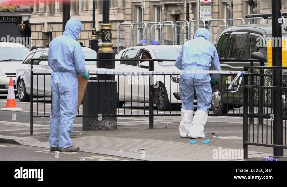 UK April 2017 police forensics working at the crime scene of knife