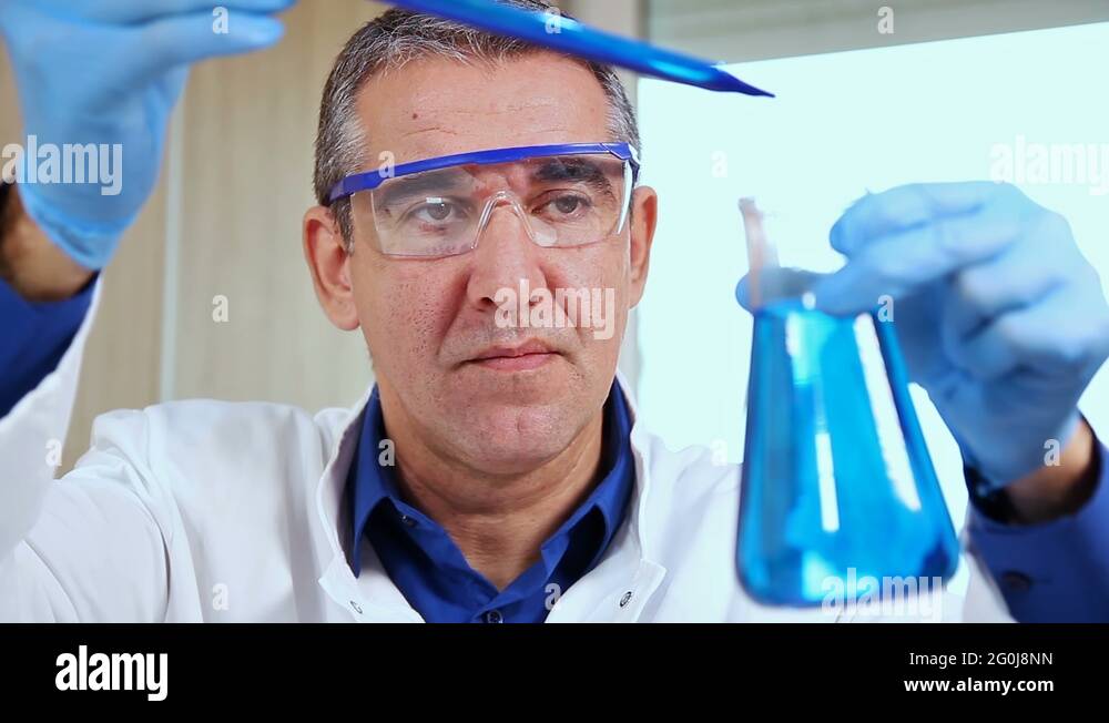 Microbiology Analyst Working with Pipette in Laboratory Stock Video