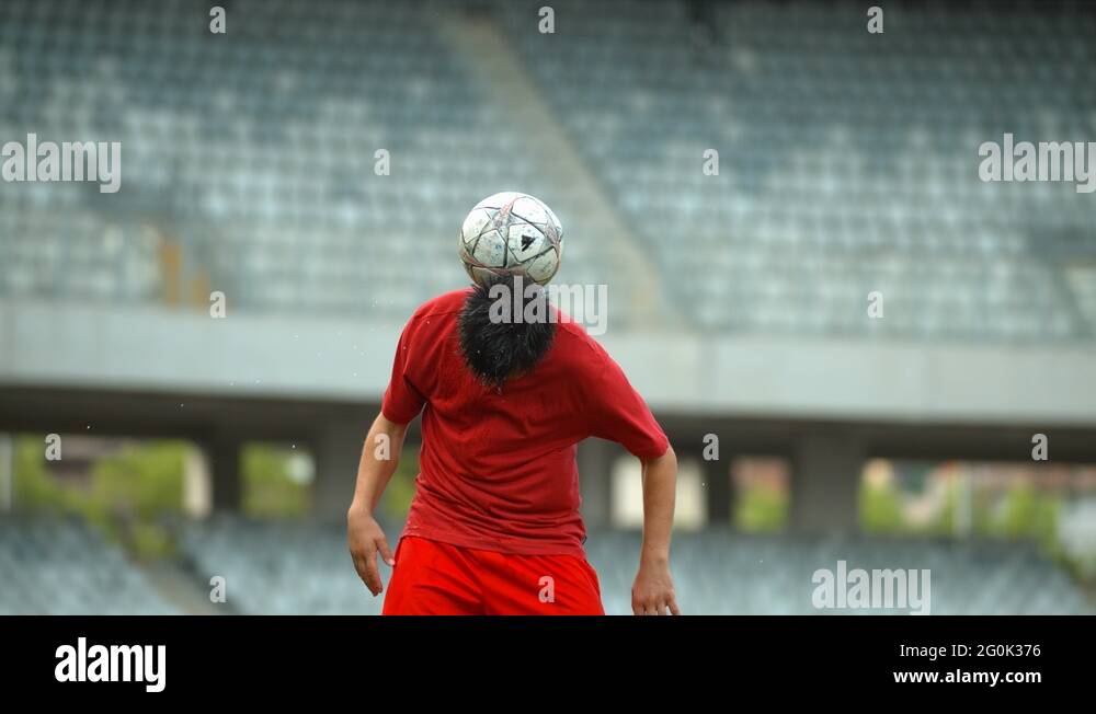 Balance soccer ball on head Stock Videos & Footage HD and 4K Video