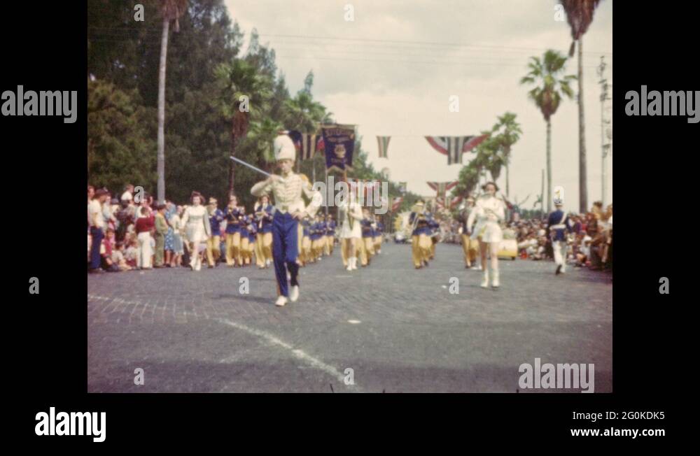 1940s Jefferson High School marching band led by drum major and baton