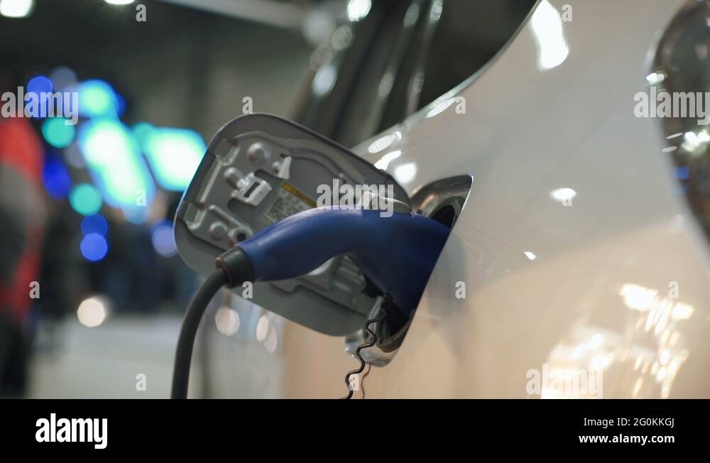 Charging the battery of an electric car Stock Video Footage Alamy
