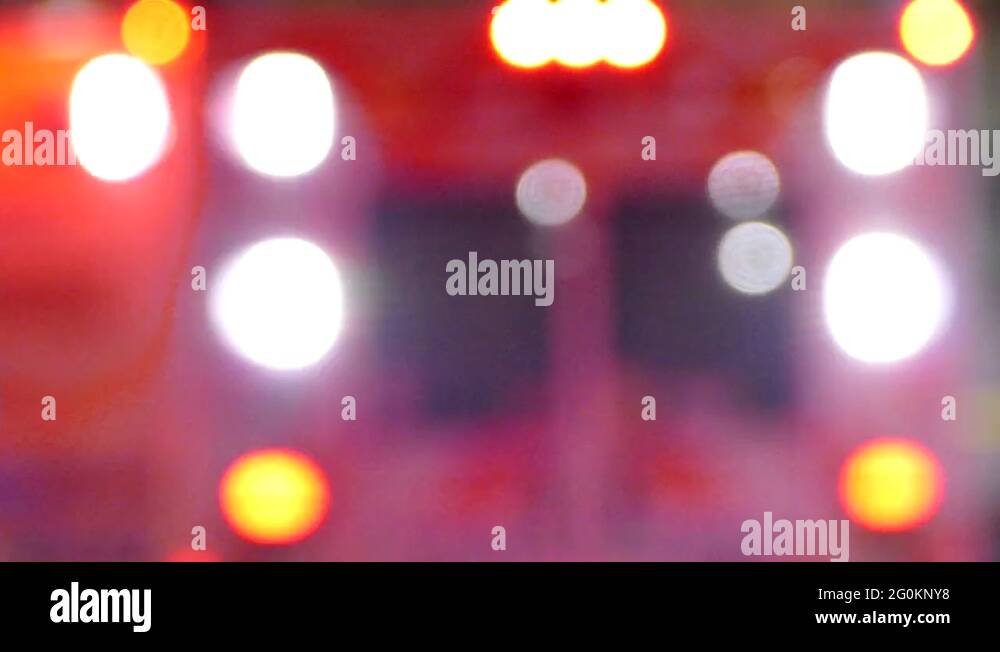 Emergency medical ambulance with flashing lights on at incident scene Stock Video Footage Alamy