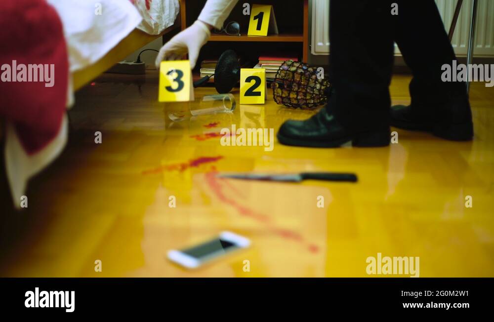 Detective using evidence markers to marking murder evidence, concept
