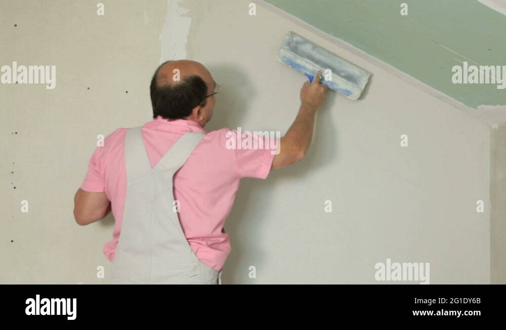 Applying Plaster to Plasterboard Wall Stock Video Footage Alamy
