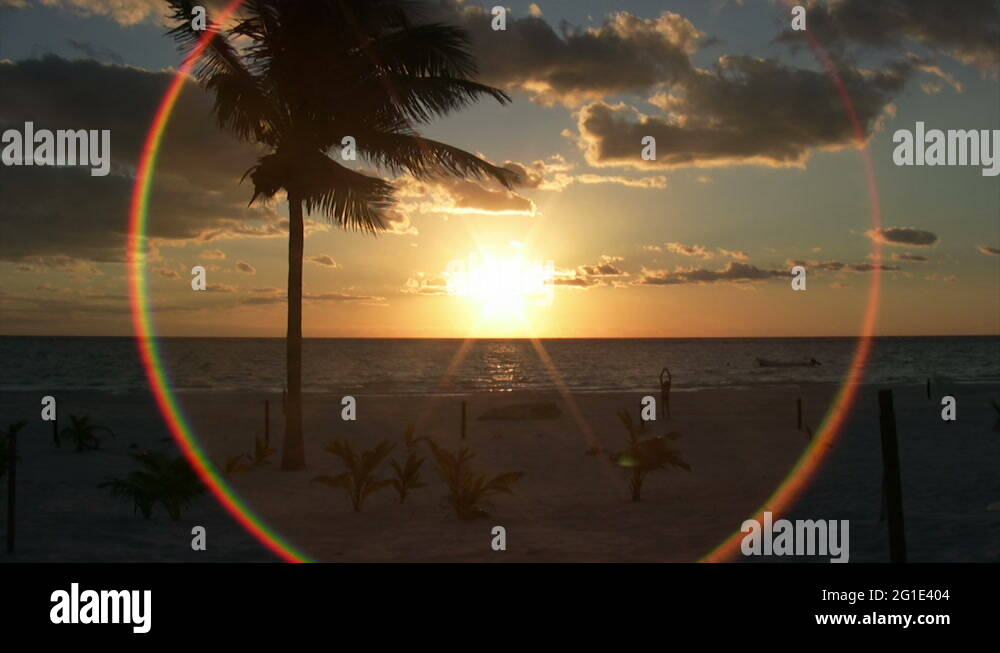 beautiful lens flare forms up while filming a sunrise Stock Video