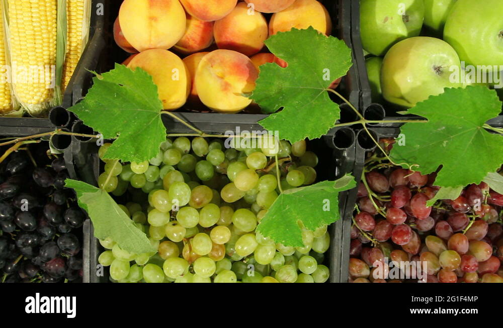DOLLY Market stall with fresh fruits and vegetables Stock Video